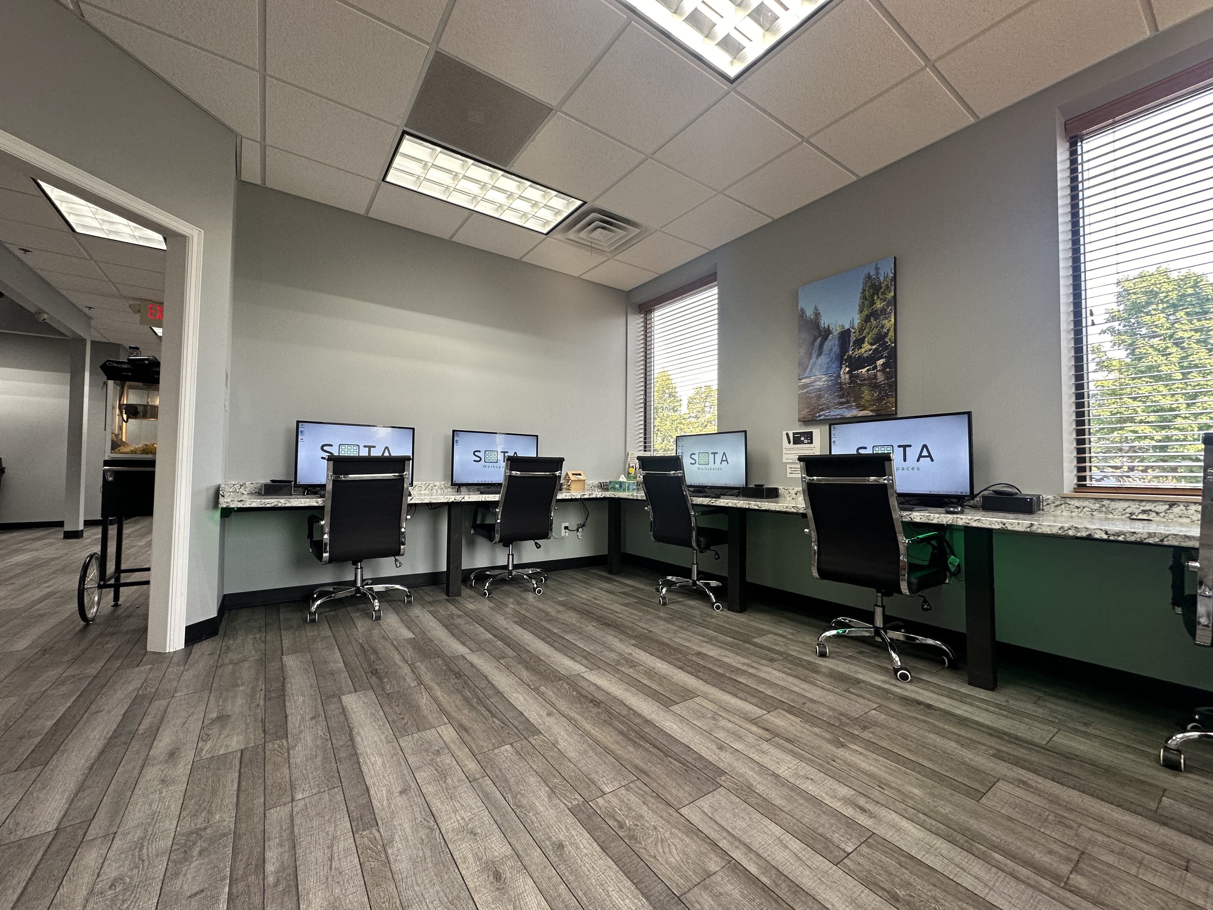 Coworking area with desks and monitors
